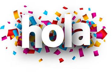 Hola sign with colorful confetti. © Vjom