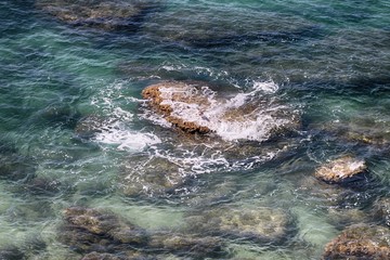 REMOLINO MAR Y ROCA