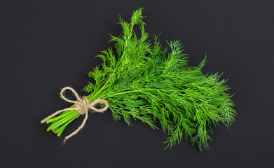 Bouquet of fresh dill bandaged with rope
