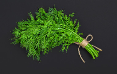 Bouquet of fresh dill bandaged with rope