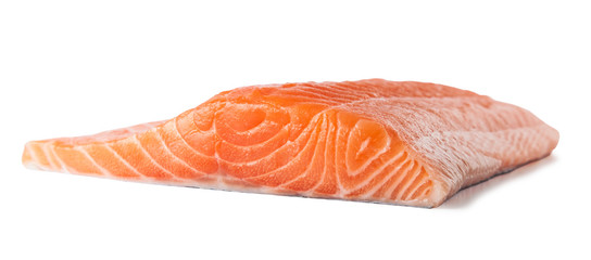Raw salmon fillet slices, isolated on a white background.