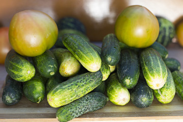 Organic tomatoes, fresh cucumber and unripe watermelon