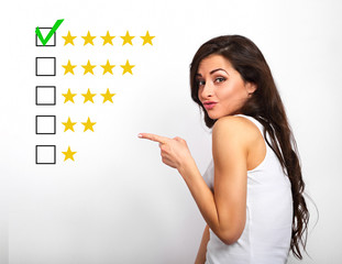 The best rating, evaluation, online rewiew. Business confident happy woman voting to five yellow...