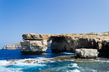 Fototapeta na wymiar Azure Window, famous stone arch of Gozo island in summer, Malta