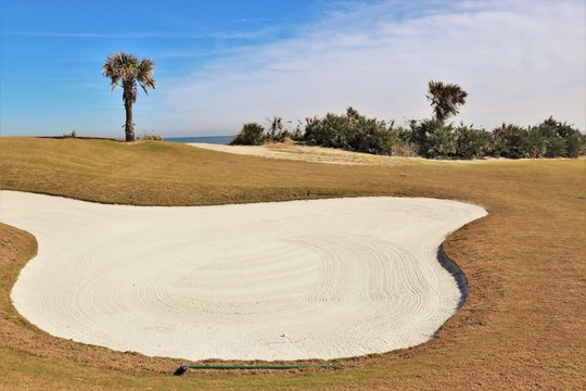 Golf course greens in a tropical setting