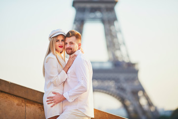 Romantic couple having a date near the Eiffel tower