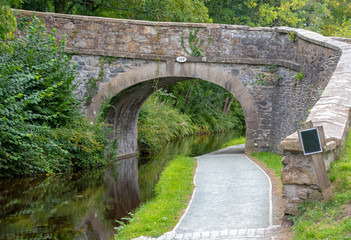 Fototapeta na wymiar Stone bridge crossing over the Shropshire Union Cana