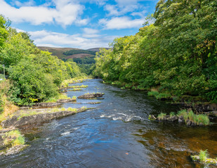 Naklejka na ściany i meble Scenic view of the river Dee at Llangollen in Wales