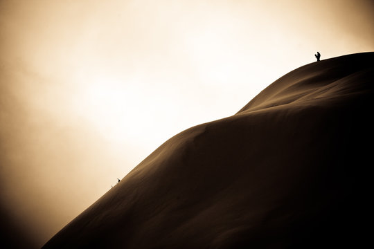 Skier at the top of a hill