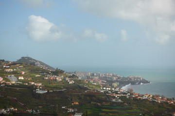 Fototapeta na wymiar View of Miradouro da Torre viewpoint of the atlantic coastline with in Câmara de Lobos, Madeira