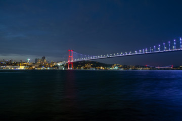 Fototapeta na wymiar Boğaz köprüsü Istanbul Bosphorus Bridge at night. 15th July Martyrs Bridge. Istanbul / Turkey.