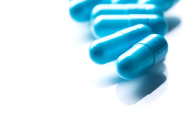 Pharmacy theme, blue medicine tablets.
