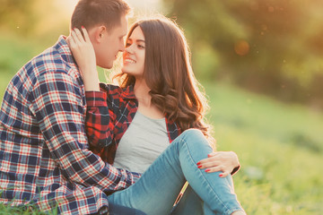 Happy couple relaxing in the park