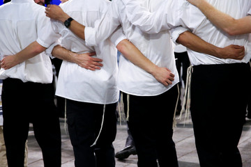 Jewish man celebrate Simchat Torah