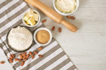 Baking ingredients and utensils on kitchen table