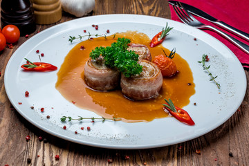 Pork medallions with bacon