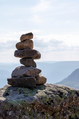 Inukshuk (Cairn) on top of a Mountain in the Grands-Jardins National Park in the Charlevoix Region in Quebec, Canada
