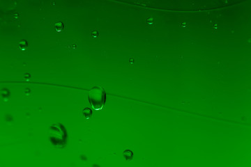 water drops isolated with green background