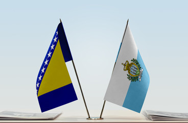 Two flags of Bosnia and Herzegovina and San Marino