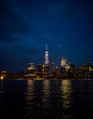 financial buildings in Manhattan at night