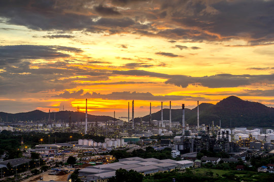 Beautiful sunset  petrochemical oil refinery factory plant cityscape of Chonburi province at night on 2017 , landscape Thailand
