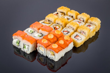 set of rolls on black with reflection