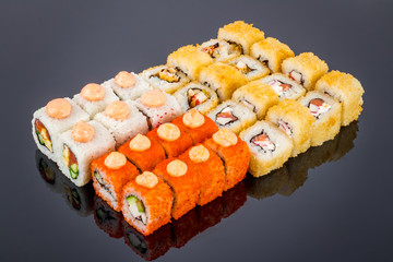 set of rolls on black with reflection