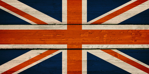 Fototapeta premium Bright Great Britain National Flag on a Wooden Background. Grunge British UK Flags Texture. 