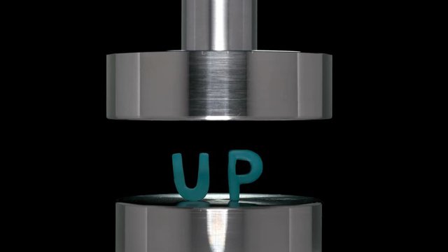 the appearance of the inscription up when lifting a rod from a hydraulic press on a white background, close-up