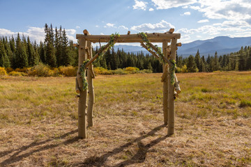 Fototapeta na wymiar Wedding Arch with fall colors in the Rocky Mountains, Colorado, USA.