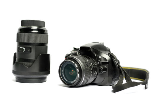 Digital SLR Camera and lens isolated on white background