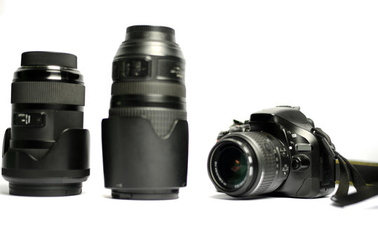 Digital SLR Camera and lens isolated on white background