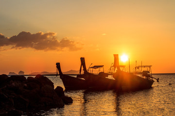 Silhouettes of long tail fishing boats, Pak Meng, Trang Province, Thailand