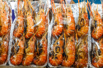 Packets of barbecued prawns