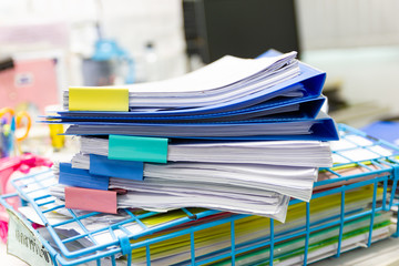file folder and Stack of business report paper file on the table in a work office, concept document in work office