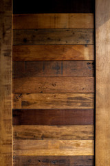 Rustic wooden panel wall background with shade
