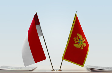 Two flags of Monaco and Montenegro