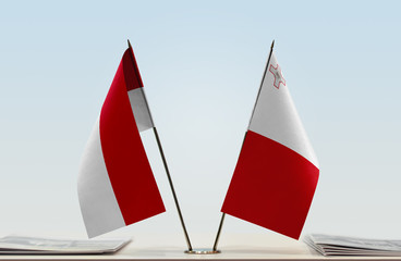 Two flags of Monaco and Malta