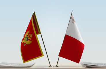 Two flags of Montenegro and Malta