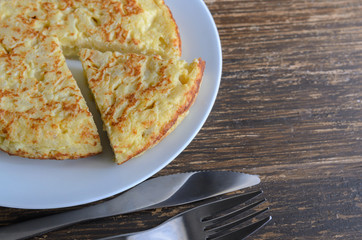  Tortilla, Spanish omelette made with eggs and popatoes.Popular tapas or snack in Spain.Copy space.