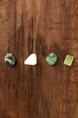 Fototapeta na wymiar An overhead photo of gemstones, healing stones with copy space