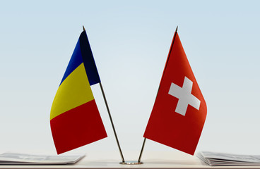 Two flags of Romania and Switzerland