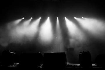 Stage lights. Black and white image - obrazy, fototapety, plakaty
