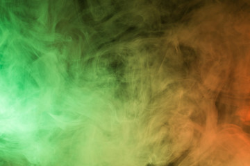 Colorful smoke close-up on a black background