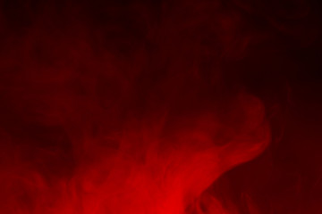 Colorful smoke close-up on a black background