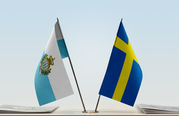 Two flags of San Marino and Sweden