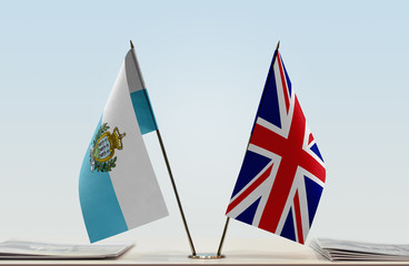 Two flags of San Marino and United Kingdom