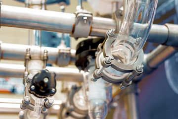 Chemical industrial equipment, glass tubes and containers.