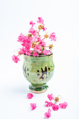 Lagerstroemia flower and pottery cup