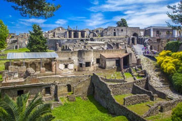 Panoramic view of the ancient city of Pompeii with houses and streets. Pompeii is an ancient Roman city died from the eruption of Mount Vesuvius in the 1st century. Naples, Italy. - obrazy, fototapety, plakaty